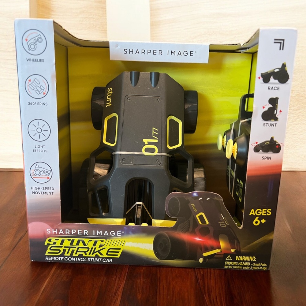 NWT Sharper Image Stunt Strike RC Car 360 Spins Lights High Speed Ages 6+
